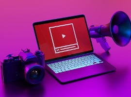video marketing concept laptop with a playing icon on the laptop picture