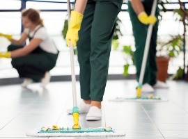 person cleaning the floor