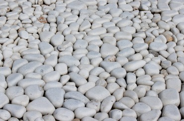 naturally polished white rock pebbles background stock photo picture