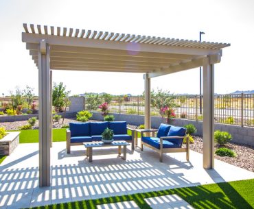 rear yard pergola covering patio furniture picture