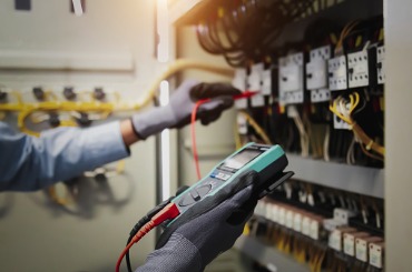 electricity and electrical maintenance service engineer hand holding picture