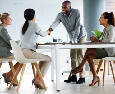 handshake b2b and business people in a meeting in a partnership agreement in a corporate